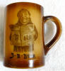 3-B mug of monk reading newspaper
