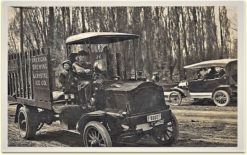 1913 postcard with Amer. Brg. & Crystal Ice Packard truck